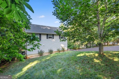 Discover lakefront living at its finest with this exceptional