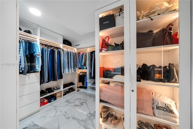 Welcome to this stunning 2-bedroom, 2-bath condo at 9 Island Ave