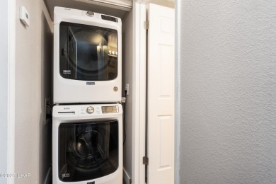 Welcome home to your quiet Xanadu resort-like condo! It's light