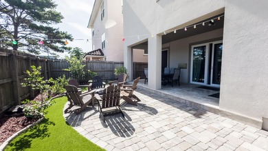 This beautifully designed home located in the exclusive gated