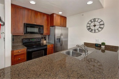 This beautiful top-floor residence in Highland Greens Lodge