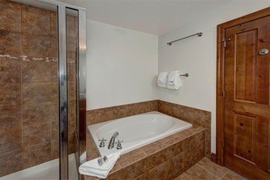 This beautiful top-floor residence in Highland Greens Lodge