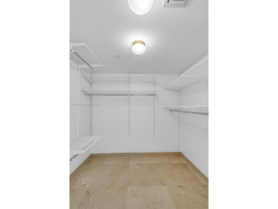 Timeless oceanfront residence in the heart of Mid-Beach. Wake up