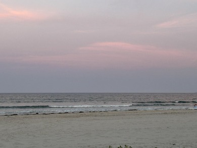 Wake up to a view of the beautiful ocean in this freshly updated