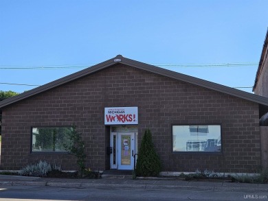 Newer construction commercial building in the middle of downtown