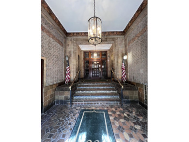 Step into refined elegance in this sixth floor residence located