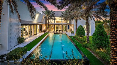 Welcome to this one-of-a-kind modern sanctuary in the heart of