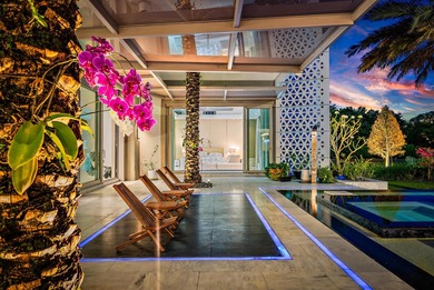 Welcome to this one-of-a-kind modern sanctuary in the heart of