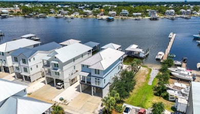 Coastal Luxury Living on Deep Water- Cotton Bayou Gem in Orange