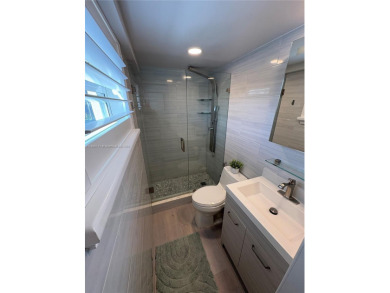 2/2 NEWLY REFINISHED UNIT BEACHFRONT ON BROADWALK WITH