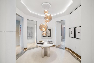 This elegantly designed 4-bedroom, 4.5-bath residence at Palazzo