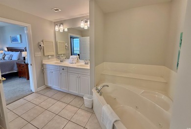 Nicely updated three-bedroom, three-bath ocean view corner unit