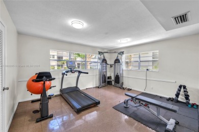 Welcome to Deerfield Beach Gardens! This 3rd-floor, beautifully