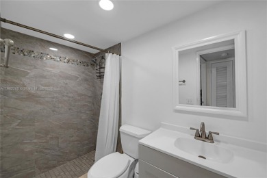 Welcome to Deerfield Beach Gardens! This 3rd-floor, beautifully