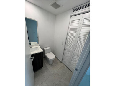 Experience elevated waterfront living in this chic 2-bed, 2