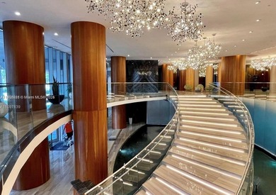 Experience elevated waterfront living in this chic 2-bed, 2