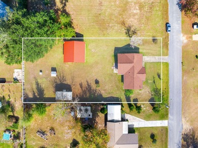 Welcome to this charming 2-bedroom, 2-bath home on a half-acre