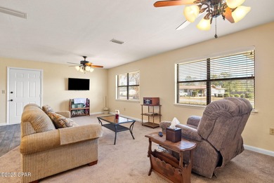 Welcome to this charming 2-bedroom, 2-bath home on a half-acre