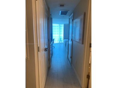 Welcome to Unit 1215 at The Q Club, a luxury condo-hotel