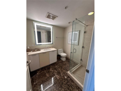 Welcome to Unit 1215 at The Q Club, a luxury condo-hotel