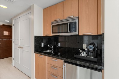 Welcome to Unit 1215 at The Q Club, a luxury condo-hotel