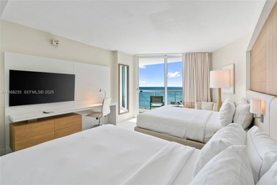 Welcome to Unit 1215 at The Q Club, a luxury condo-hotel