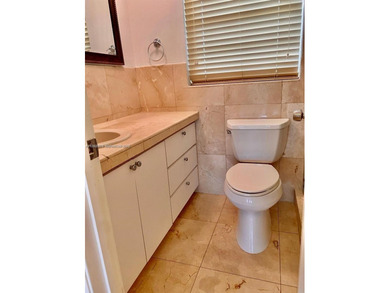 GUARD GATED KINGS CREEK SOUTH CONDOMINIUM WITH CANAL VIEW FOR