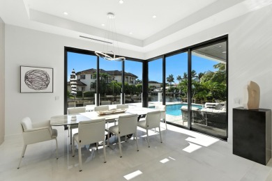 This extraordinary two-story waterfront estate is purpose-built