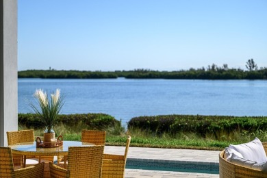 Brand New luxury construction at gated Grand Harbor! Enjoy true