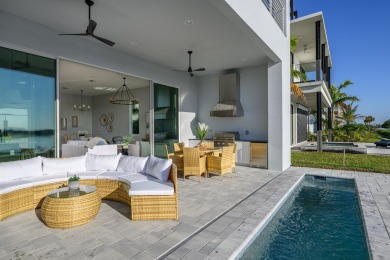 Brand New luxury construction at gated Grand Harbor! Enjoy true