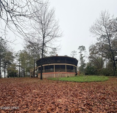 A truly one-of-a-kind 14-sided custom home! Potential !! This