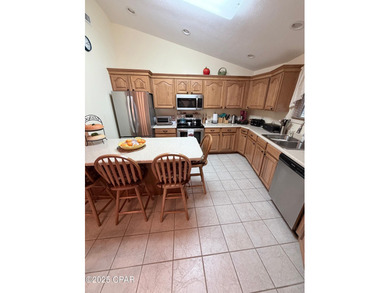 A truly one-of-a-kind 14-sided custom home! Potential !! This