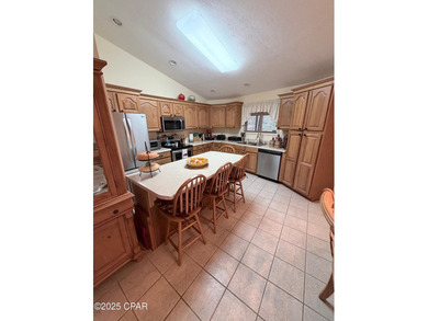 A truly one-of-a-kind 14-sided custom home! Potential !! This