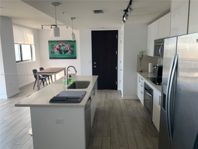 Corner unit 1 bedroom plus den, fully furnished and equipped