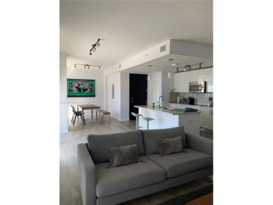 Corner unit 1 bedroom plus den, fully furnished and equipped