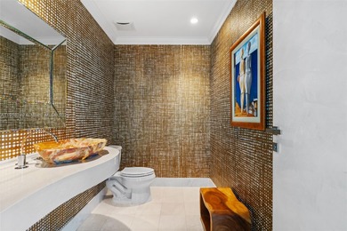 Experience elevated oceanfront living in this reimagined 8,332