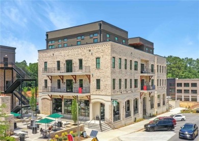 Welcome to your Downtown Woodstock dream home! This exceptional