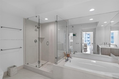 Enjoy ocean & city views from the expansive terrace of this