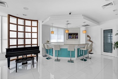 Enjoy ocean & city views from the expansive terrace of this