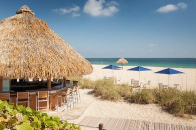 Enjoy ocean & city views from the expansive terrace of this