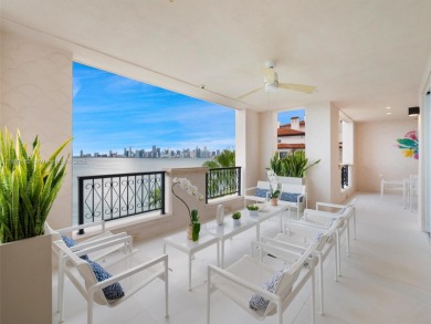 Live the Fisher Island lifestyle in this completely renovated