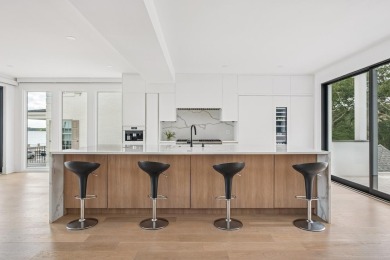 This remarkable contemporary residence on prestigious Murray