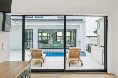 This remarkable contemporary residence on prestigious Murray