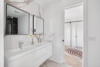 This remarkable contemporary residence on prestigious Murray