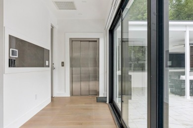 This remarkable contemporary residence on prestigious Murray