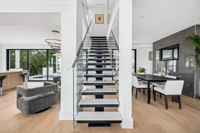 This remarkable contemporary residence on prestigious Murray