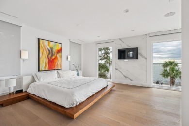 This remarkable contemporary residence on prestigious Murray