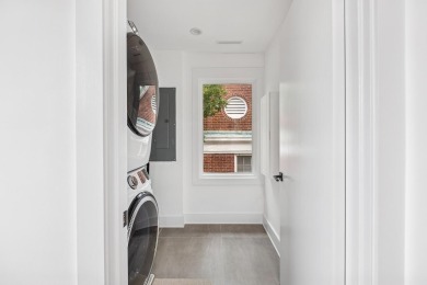 This remarkable contemporary residence on prestigious Murray