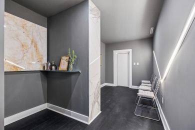 This remarkable contemporary residence on prestigious Murray