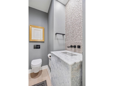 This remarkable contemporary residence on prestigious Murray